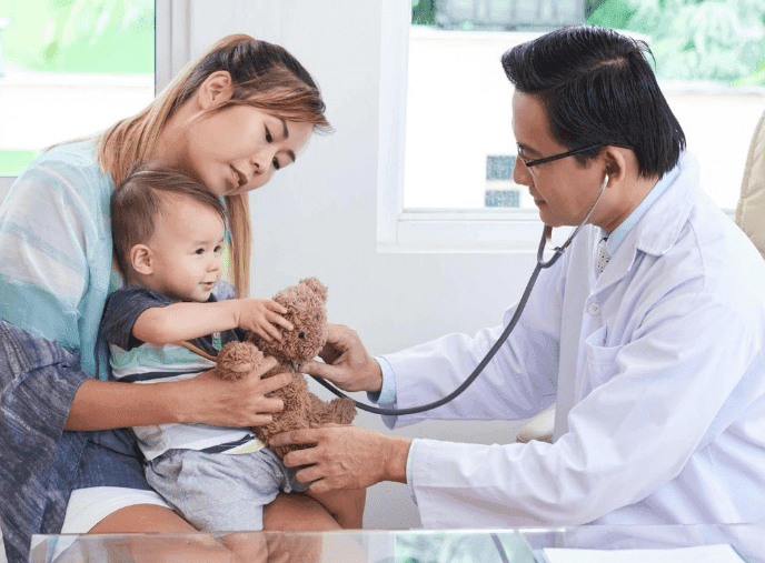 Picture of doctor listening to lung sounds